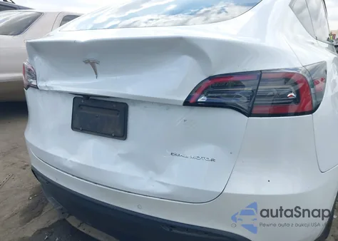 2022 Tesla Model Y из США, поврежденный, VIN 7SAYGDEE1NF386630